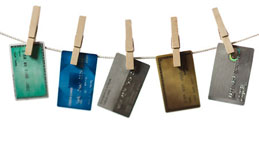 Credit Cards hanging from a Clothesline 